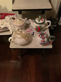 Lot of 4 tea pots 5in