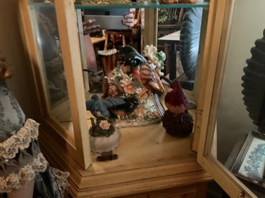 Lot of bird figures and statues