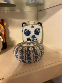 lot of 2 blue and white vases and covered bowls; vase stands 9" tall