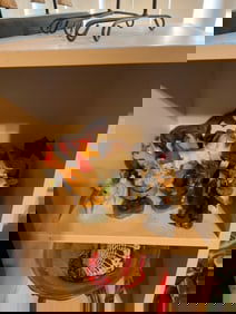 shelf full of small figruines