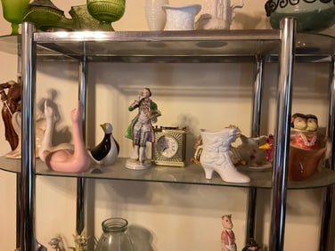 lot full of various staues, figurines and more