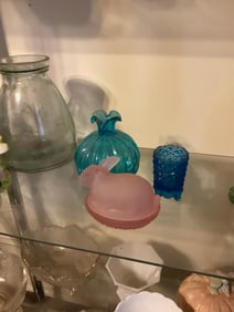 lot of blue glass and pink covered bunny dish