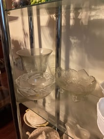 lot of clear glass serving dishes and more