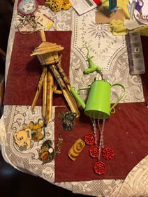 lot of wind chimes and sun catchers