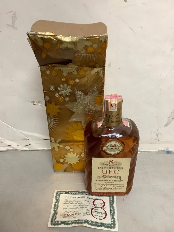 1955 Imported O.F.C. by Schenley canadian whisky 86.8 proof 4/5 quart(sealed- with certificate of (1 of 1)