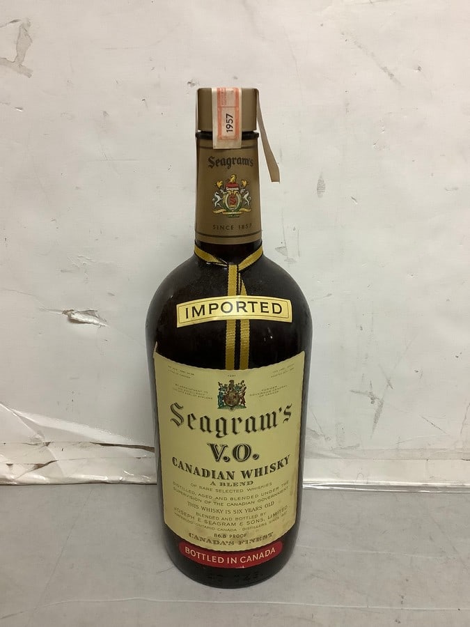 1957 Imported Seagram's V.O. canadian whisky 86.8 proof 40ozs.(sealed): Any contents in bottle is Free; You are bidding on the bottle & unbroken tax stamp