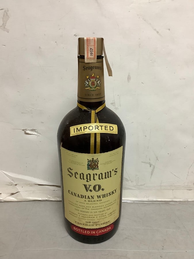 1957 Imported Seagram's V.O. canadian whisky 86.8 proof 40ozs.(sealed): Any contents in bottle is Free; You are bidding on the bottle & unbroken tax stamp