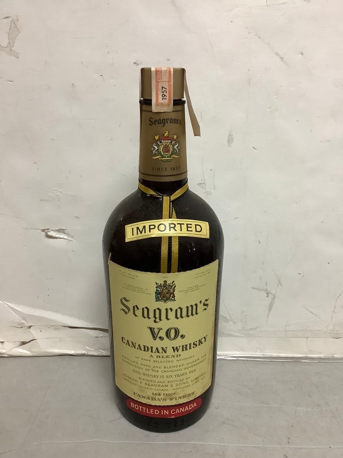1957 Imported Seagram's V.O. canadian whisky 86.8 proof 40ozs.(sealed): Any contents in bottle is Free; You are bidding on the bottle & unbroken tax stamp
