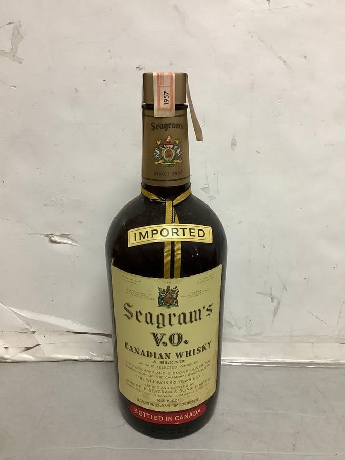 1957 Imported Seagram's V.O. canadian whisky 86.8 proof 40ozs.(sealed): Any contents in bottle is Free; You are bidding on the bottle & unbroken tax stamp