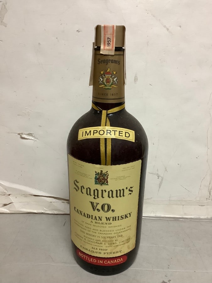 1957 Imported Seagram's V.O. canadian whisky 86.8 proof 40ozs.(sealed): Any contents in bottle is Free; You are bidding on the bottle & unbroken tax stamp