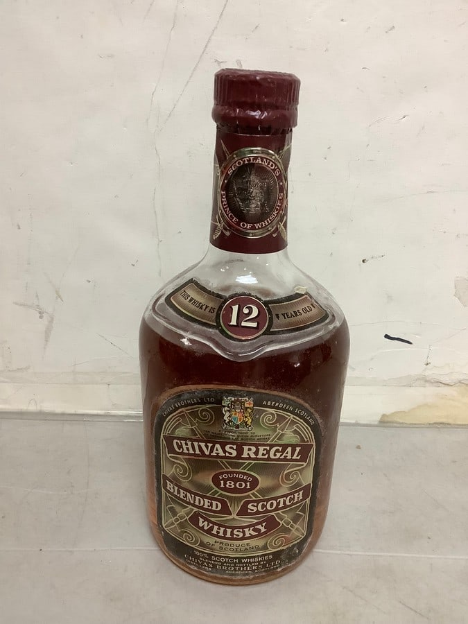 1950's/1960's Chivas Regal blended scotch whisky(mostly full): Any contents in bottle is Free; You are bidding on the bottle & unbroken tax stamp