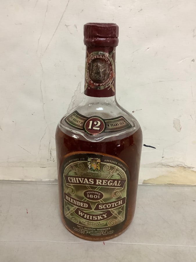 1950's/1960's Chivas Regal blended scotch whisky(mostly full): Any contents in bottle is Free; You are bidding on the bottle & unbroken tax stamp