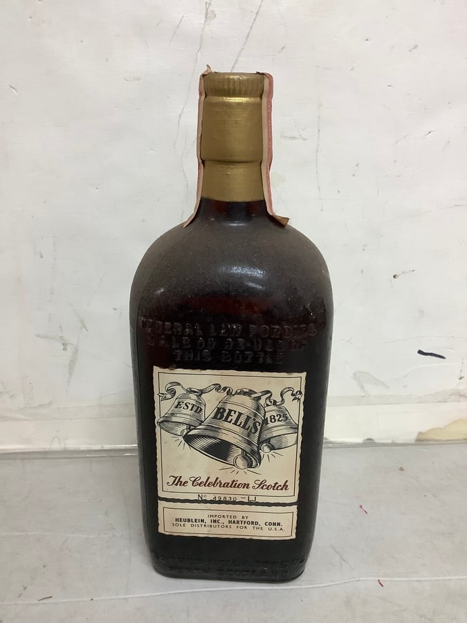 Bell's Royal Vat blended Scotch Whisky(86 proof 4/5 quart-sealed): Any contents in bottle is Free; You are bidding on the bottle & unbroken tax stamp