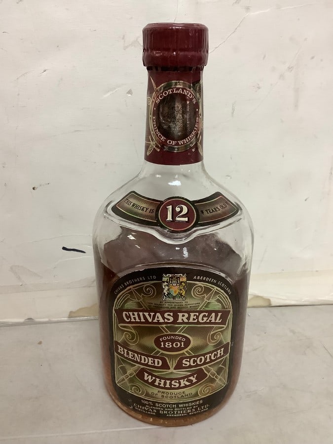 1950's/1960's Chivas Regal blended scotch whisky(half full): Any contents in bottle is Free; You are bidding on the bottle & unbroken tax stamp