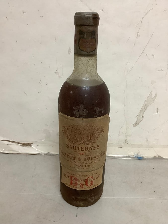 1961 Sauternes Barton & Guestier(1 pint, 8.5 fl.oz., unopened): Any contents in bottle is Free; You are bidding on the bottle & unbroken tax stamp