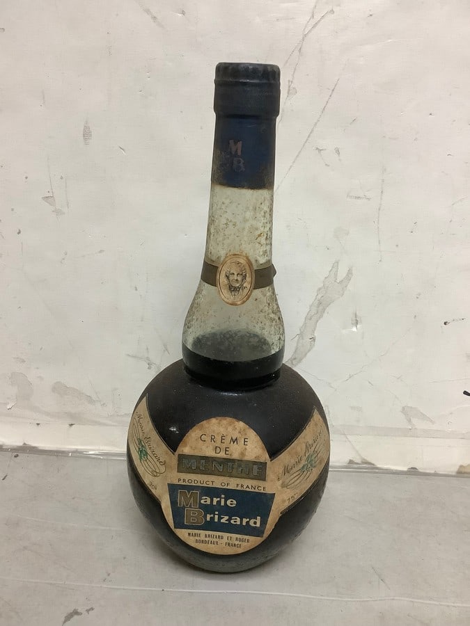 1950's/1960's Marie Brizard Creme de Menthe (30%, 75cl-mostly full): Any contents in bottle is Free; You are bidding on the bottle & unbroken tax stamp
