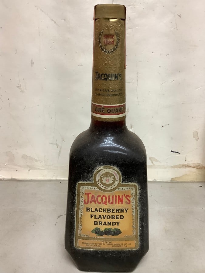 1950s/60s Jacquins Blackberry Flavored Brandy 70 Proof 1 Qt (Sealed): Any contents in bottle is Free; You are bidding on the bottle & unbroken tax stamp