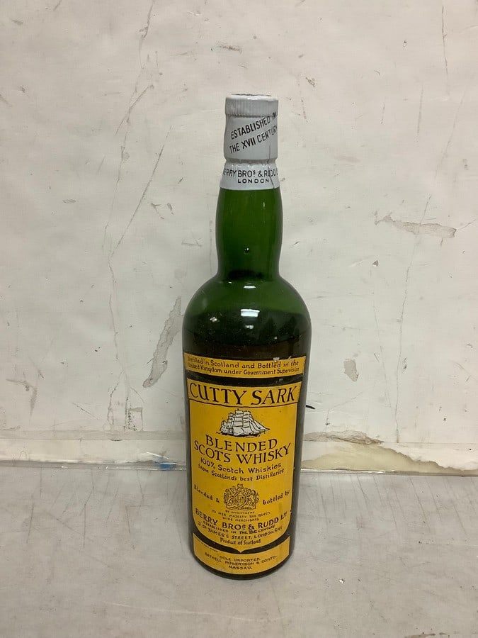 1950's/1960's Cutty Sark blended Scots Whisky 86 proof 4/5 quart(sealed): Any contents in bottle is Free; You are bidding on the bottle & unbroken tax stamp