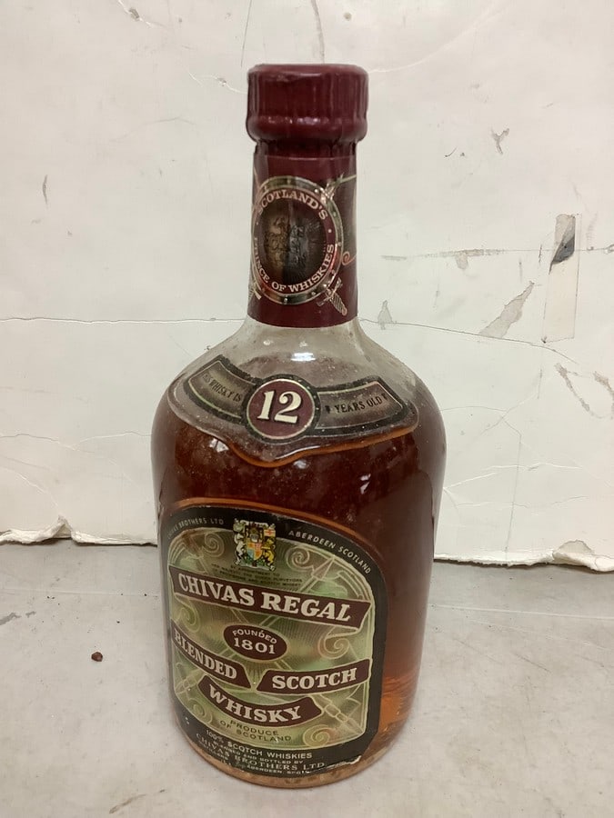 Chivas Regal blended scotch whisky(mostly full): Any contents in bottle is Free; You are bidding on the bottle & unbroken tax stamp