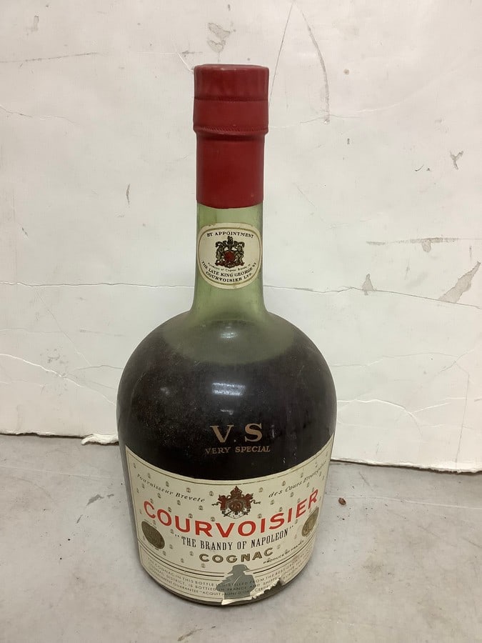 Courvoisier cognac(mostly full): Any contents in bottle is Free; You are bidding on the bottle & unbroken tax stamp