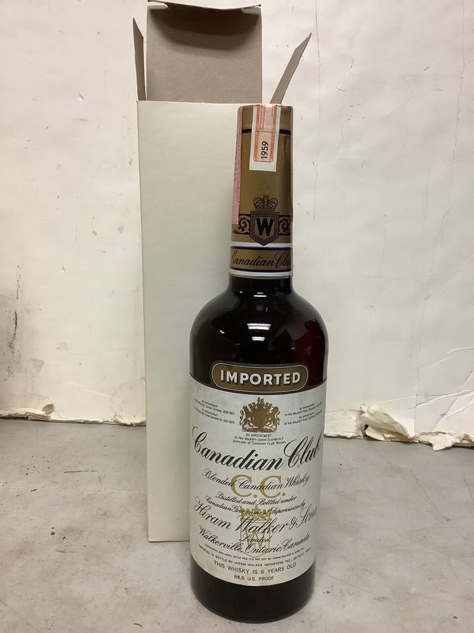 1959 Hiram Walker blended Canadian Whisky 86.8 proof 4/5 quart(sealed): Any contents in bottle is Free; You are bidding on the bottle & unbroken tax stamp