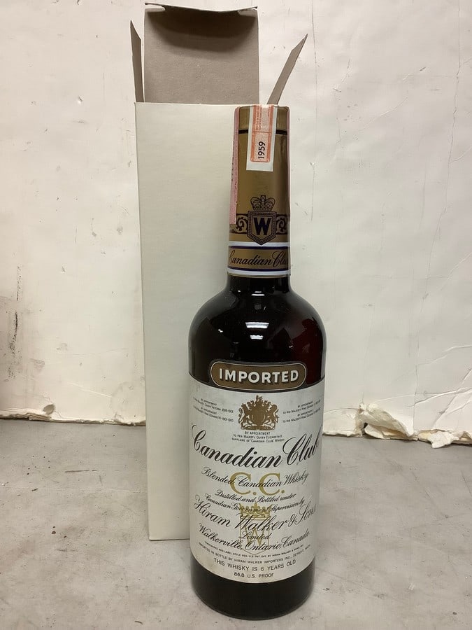 1959 Hiram Walker blended Canadian Whisky 86.8 proof 4/5 quart(sealed): Any contents in bottle is Free; You are bidding on the bottle & unbroken tax stamp