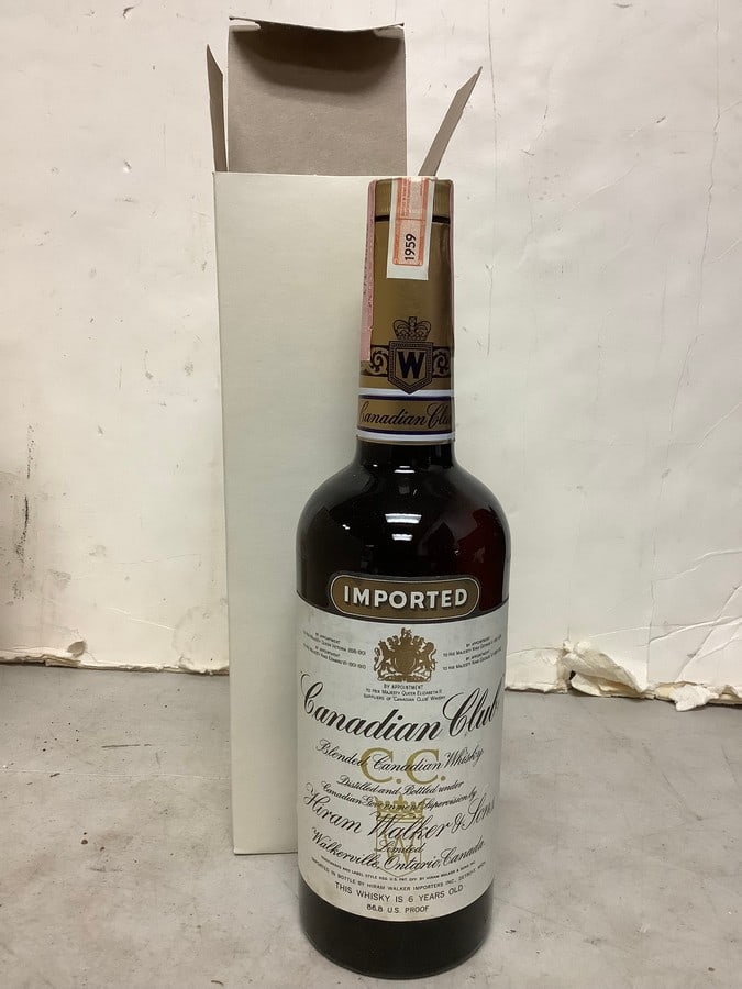 1959 Hiram Walker blended Canadian Whisky 86.8 proof 4/5 quart(sealed): Any contents in bottle is Free; You are bidding on the bottle & unbroken tax stamp