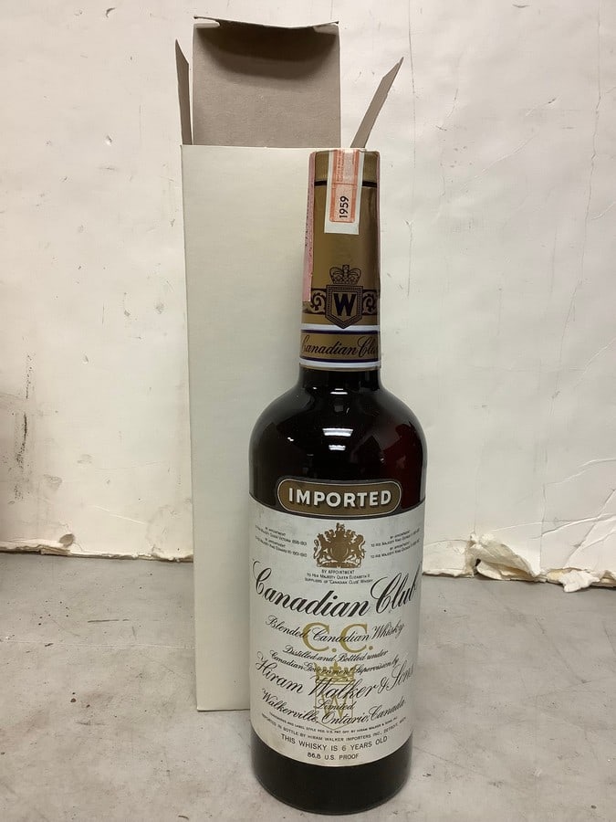 1959 Hiram Walker blended Canadian Whisky 86.8 proof 4/5 quart(sealed): Any contents in bottle is Free; You are bidding on the bottle & unbroken tax stamp