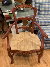 Wicker seat carved chair