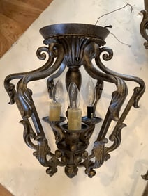 Ceiling hanging light fixture(16in.long-one wax cover missing)