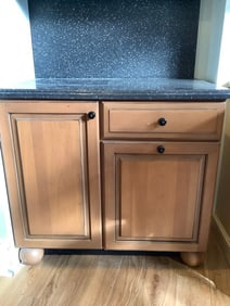 Wooden kitchen cabinet with drawers and shelving(36in.tall) and Black kitchen cabinet with