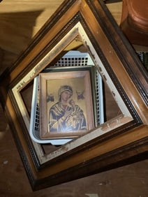 Empty frame and various framed artwork