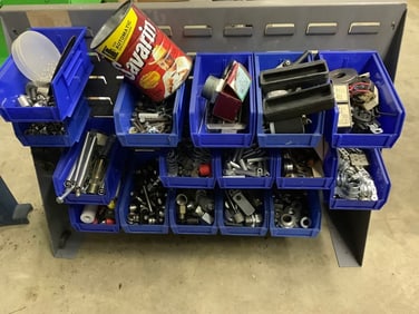 Contents on shelf(Nut and bolt bins and supplies)