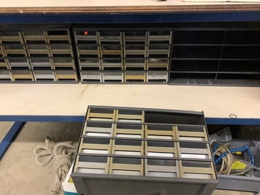 Organizer bins full of supplies