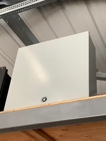Metal toolbox with nuts and bolts