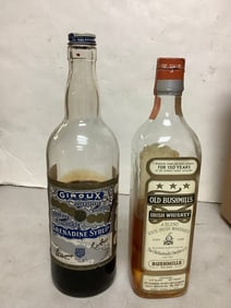 Old Bushmills Irish Whiskey 86 proof one quart(about 1/2 full) and Giroux grenadine syrup(1/2 full)