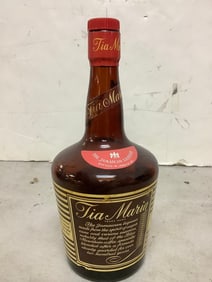 Tia Maria jamaican liqueur 55 proof 26 2/3 fl.oz.(half full)