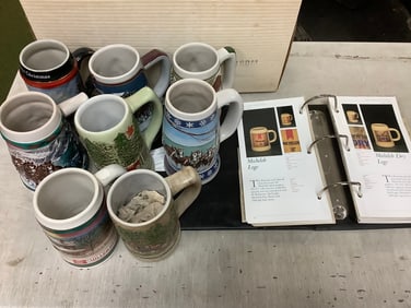 Budweiser beer mugs(tallest 7in.) with Collector's Guide to Steins book