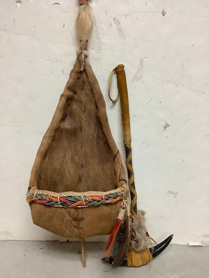 Primitive woven basket and horn rattle(longest 34in.): Primitive woven basket and horn rattle(longest 34in.)
