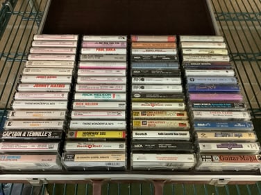 Various casettes in case(Paul Anka, Johnny Mathis, and more)