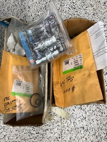 2 boxes of new parts