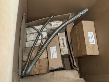 Large box of battery charger rebuild parts