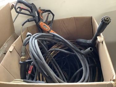 Box full of Karcher nozzles,hoses, and more