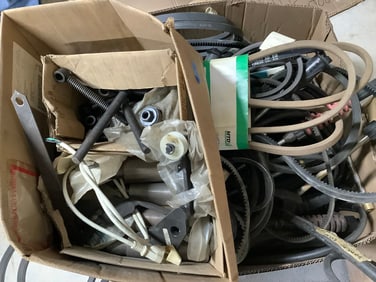 Large amount of new belts, pressure washer hoses, and more