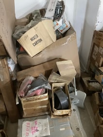 Large pile of anchor bolts, rebuild kits, and more