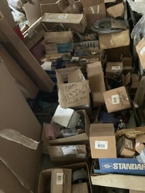 Large pile of anchor bolts, rebuild kits, and more