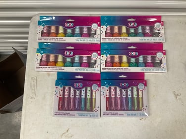 Lot of lip gloss and nail polish