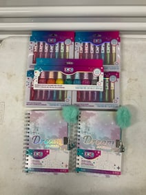 Lot of Rainbow lip gloss and nail polish and journals
