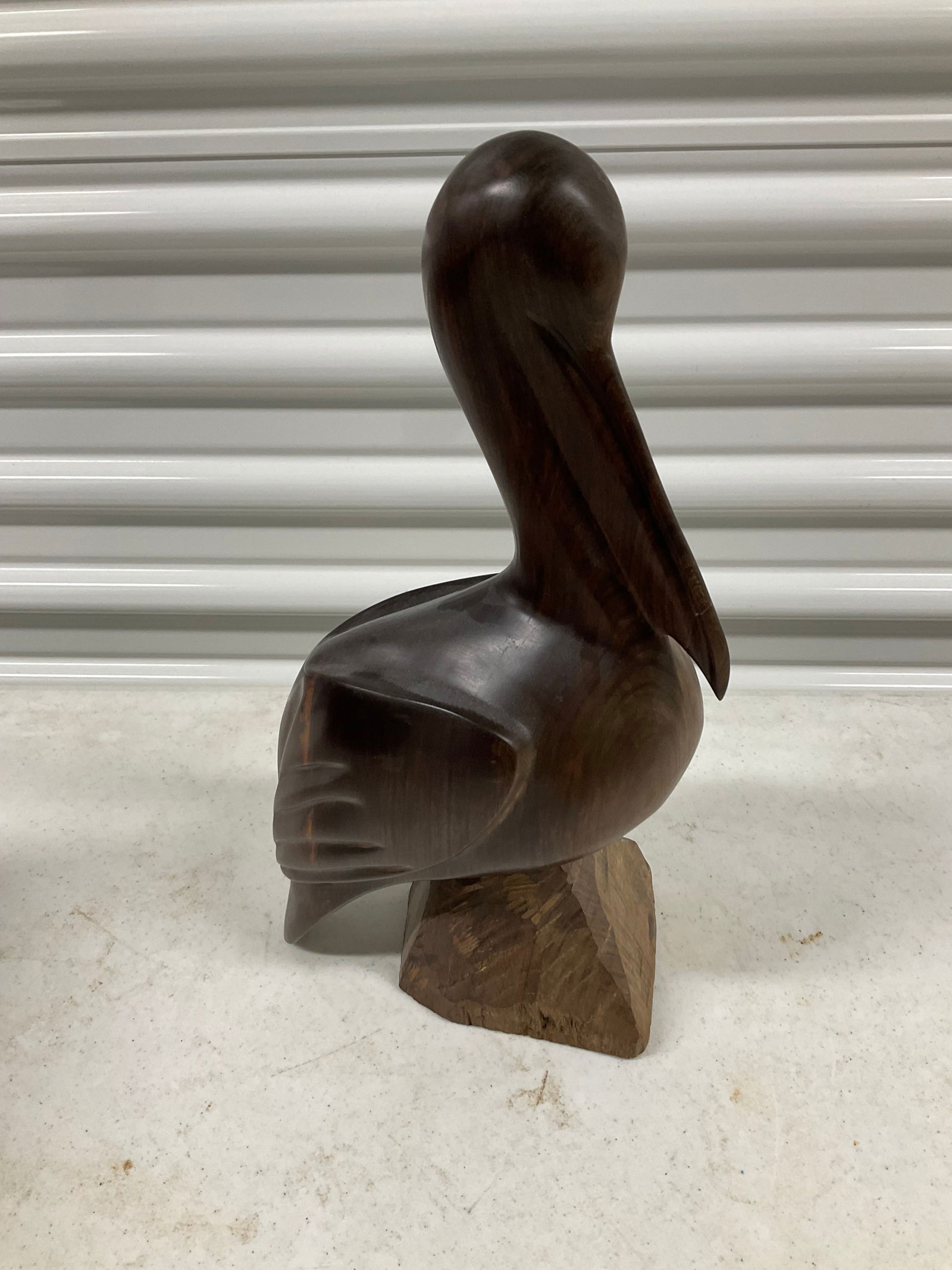 Iron wooden hand carved pelican statue (1 of 1)