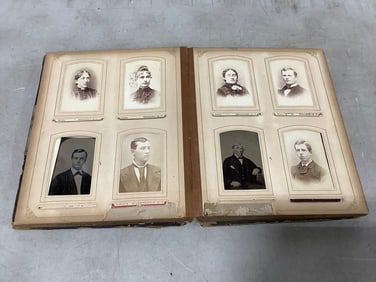 Vintage scrapbook with photographs inside
